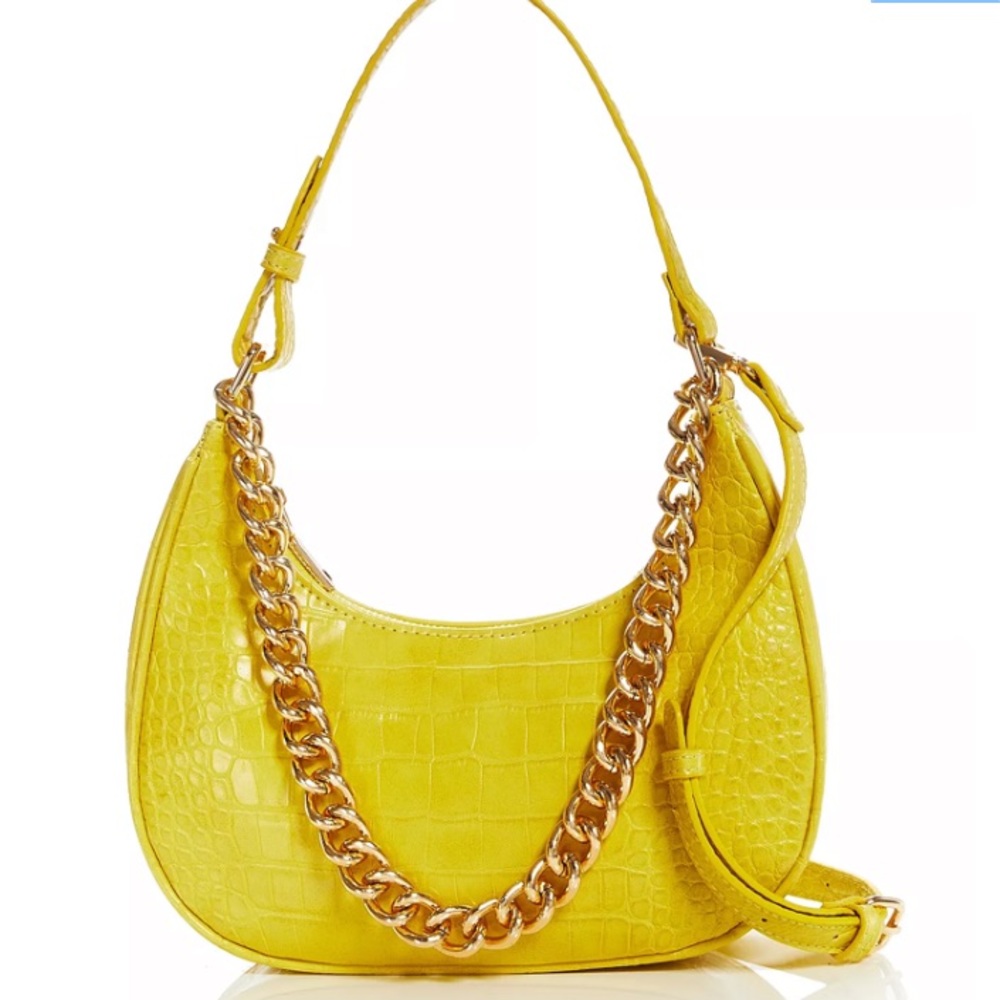 Aqua shoulder bag in yellow handbag can also be worn as a crossbody bag.
